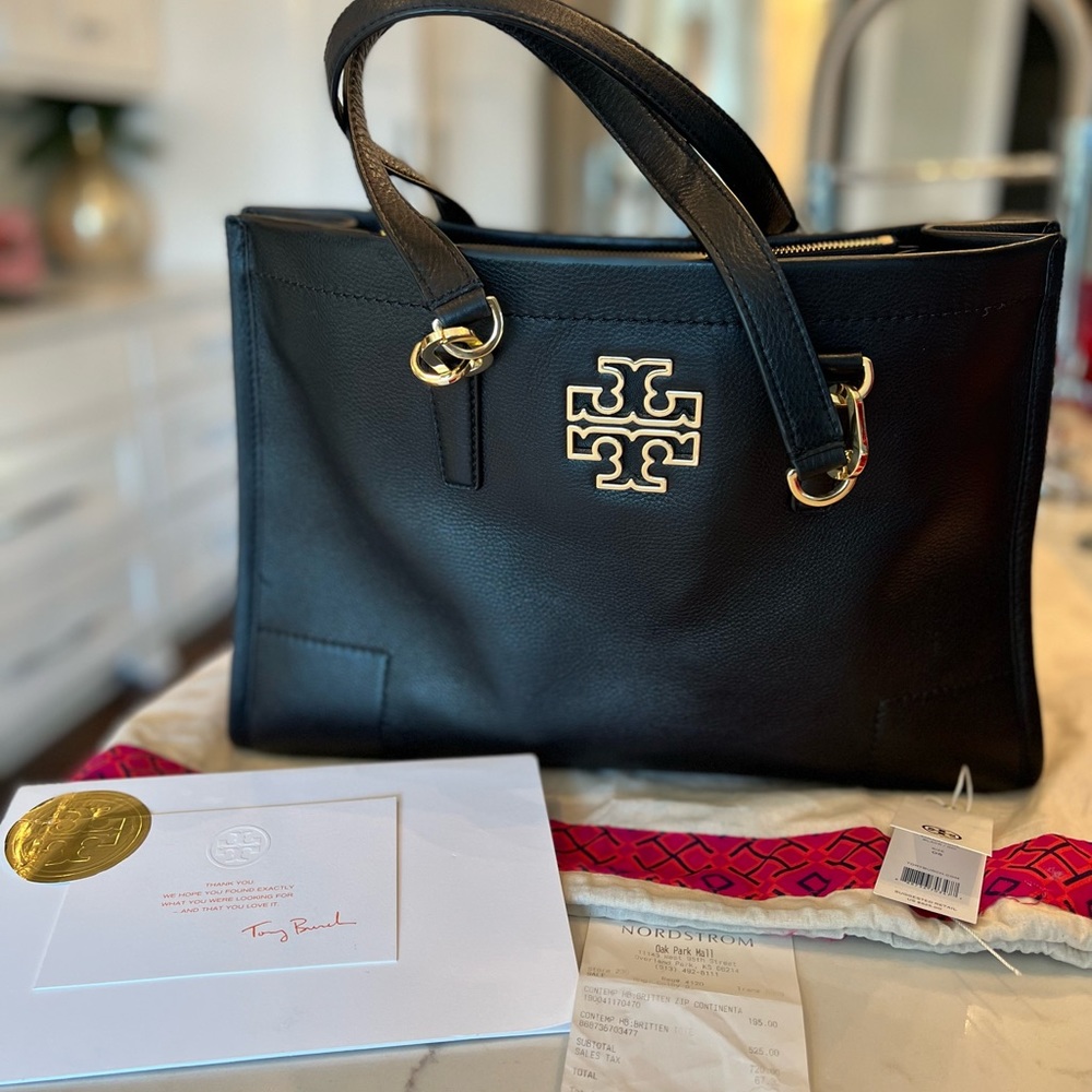 Tory Burch Britton Tote. Black soft leather Style 31159878 With tags Used once.